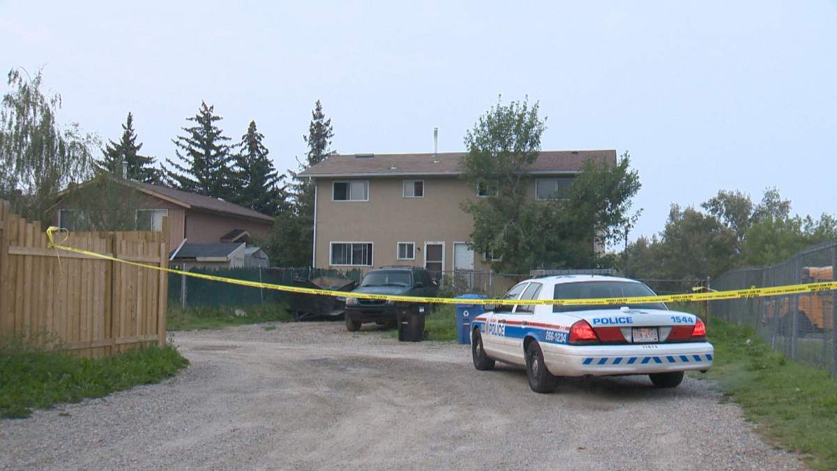 Police investigate a death in the 400 block of Pinehill Road N.E. on Wednesday, August 25, 2015.