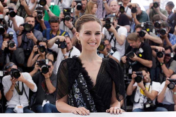Director and actor Natalie Portman poses for photographers during a photo call for the film A Tale of Love and Darkness, at the 68th international film festival, Cannes, southern France, Sunday, May 17, 2015.