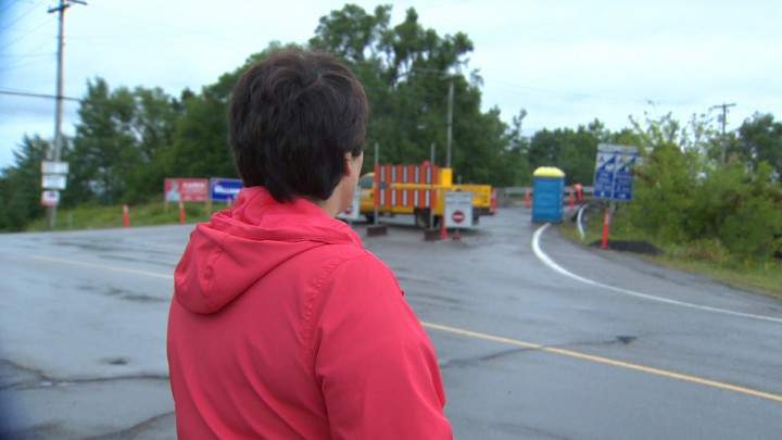 Brenda Richards looks on at a construction zone close to her home in New Brunswick.