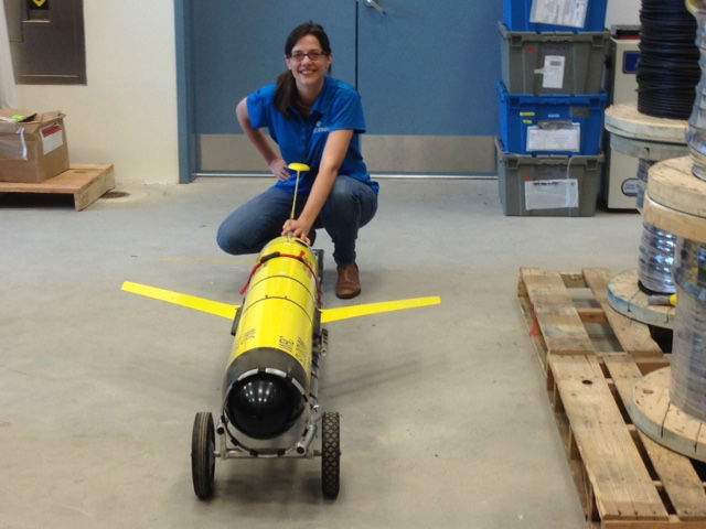 Kim Davies a conducts research for the Marine Environmental Observation Prediction and Response Network with one of the ocean gliders.