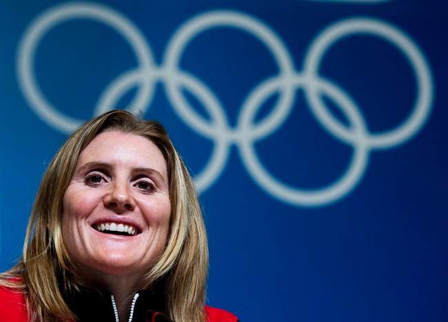 Hayley Wickenheiser smiles during a press conference before the 2014 Sochi Winter Olympics in Sochi, Russia on Wednesday, February 5, 2014. 