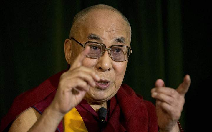 The Dalai Lama speaks at the press conference
The Dalai Lama at Magdalen College, Oxford, Britain - 14 Sep 2015.