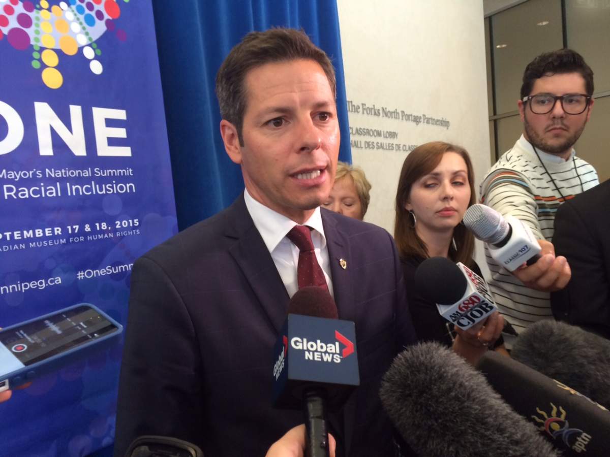Mayor Brian Bowman answers questions at the ONE Summit on Friday. 