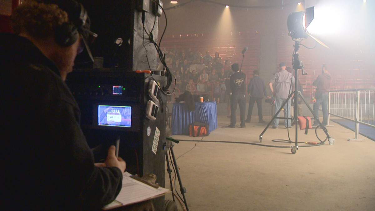 The "Chokeslam" crew shoot crowd reaction shots.