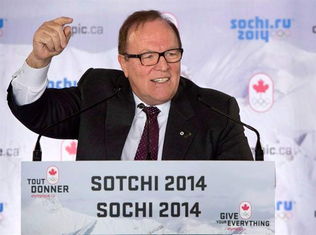 FILE -- Marcel Aubut addresses athletes during the announcement of the Canadian bobsled team for the 2014 Olympic Winter Games in Sochi, Monday, December 16, 2013 in Montreal. Aubut has stepped down as president of the Canadian Olympic Committee and chairman of the Canadian Olympic Foundation as he is investigated for sexual harassment. 
