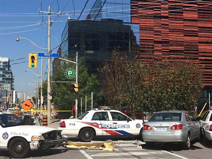 A close-up photo of the damage done to police cruisers and a silver Toyota Corolla after a suspect was apprehended following a shooting in the Distillery District on Sept. 16, 2015.