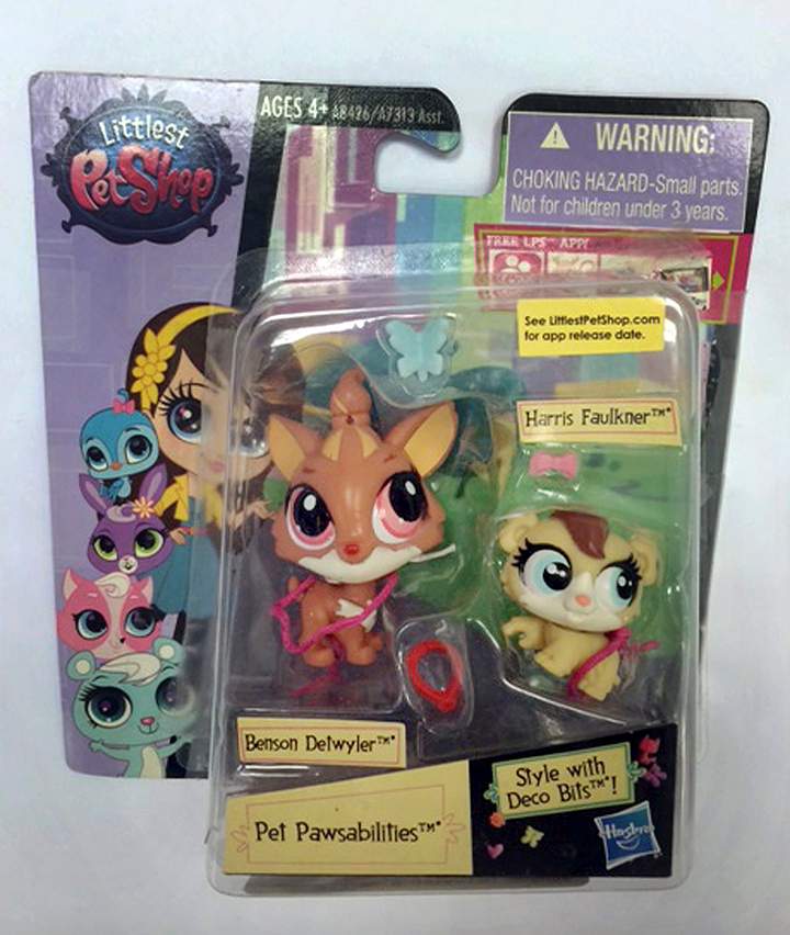 This June 23, 2015 photo released by the Hogan Lovells law firm shows toys from Hasbro’s “Littlest Pet Shop” line in New York, including characters named Benson Detwyler and Harris Faulkner.