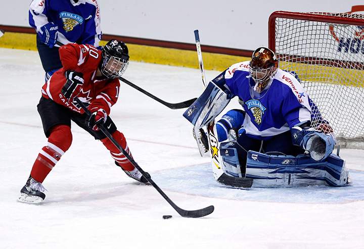 Canada’s Gillian Apps takes a shot on Finland goalie Noora Raty during the third period of a Four Nations Cup women’s hockey game Tuesday, Nov. 5, 2013, in Lake Placid, N.Y.