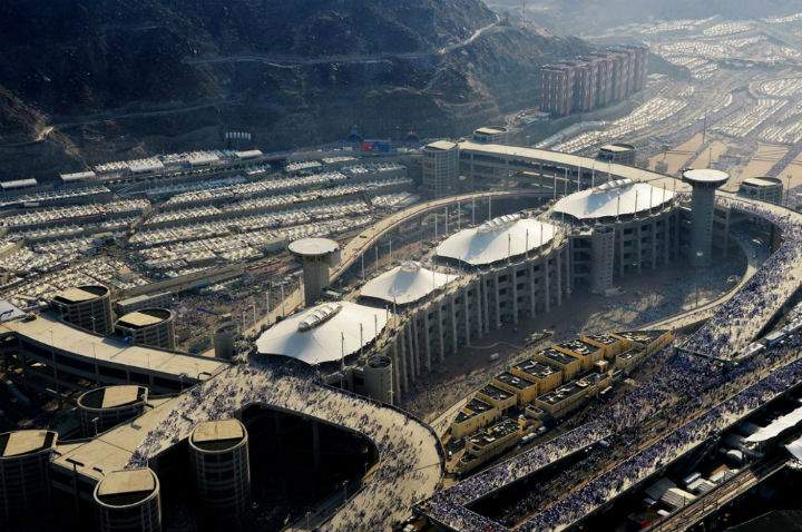 In this image released by the Saudi Press Agency (SPA), hundreds of thousands of Muslim pilgrims make their way to cast stones at a pillar symbolizing the stoning of Satan in a ritual called “Jamarat,” the last rite of the annual hajj, on the first day of Eid al-Adha, in Mina on the outskirts of the holy city of Mecca, Saudi Arabia, Thursday, Sept. 24, 2015.