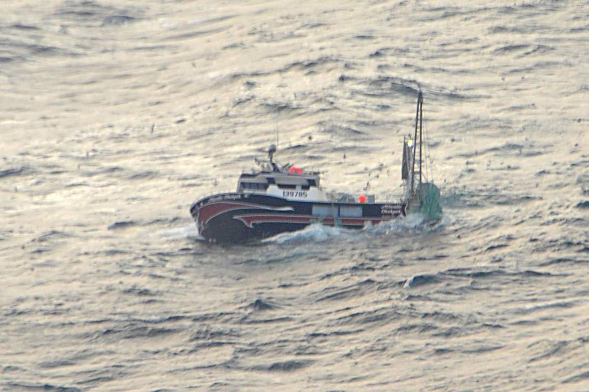 A partially submerged fishing vessel is found abandoned south-east of Iqaluit on 21 Sept 2015.