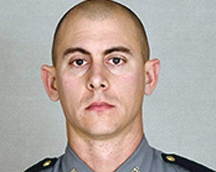 This undated photo provided by the Kentucky State Police shows Trooper Joseph Cameron Ponder. 