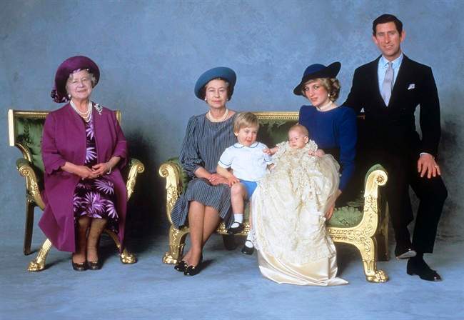 This is a Dec. 21, 1984 file photo of from left to right, the Queen Mother, Queen Elizabeth II, Prince William, Prince Harry and the Prince and Princess of Wales after the christening ceremony of Prince Harry in London.