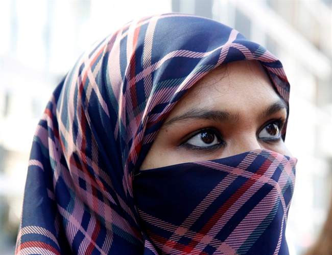 Section 10 of Quebec's law on religious neutrality, passed in October 2017, forces everyone to show their face when receiving or giving a public service. A judge has once again suspended section 10 of the law. Thursday, June 28, 2018.