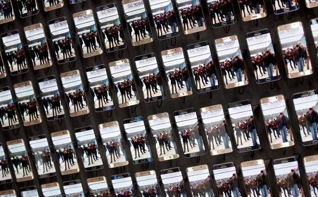 Samsung smartphones are displayed after a press conference.