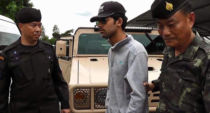 In this image provided by the National Council for Peace and Order (NCPO) Thai authorities arrest a man they believe is part of a group responsible for a deadly bombing at a shrine in central Bangkok on Aug. 17, 2015.