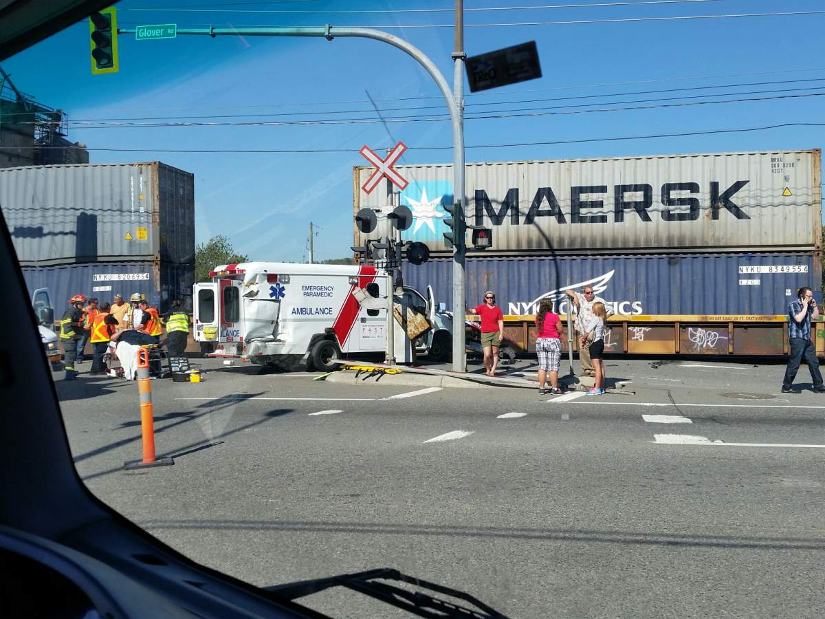 Emergency crews on scene of a collision between a train and an ambulance in Langley.