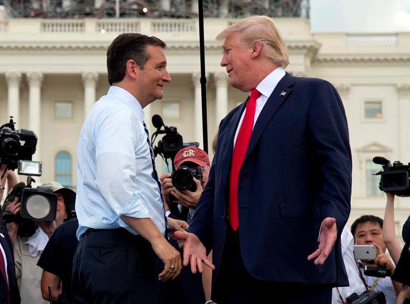 Republican presidential candidate Donald Trump and Republican presidential candidate Sen. Ted Cruz, R-Texas, greet each other on stage during a rally organized by Tea Party Patriots in on Capitol Hill in Washington, Wednesday, Sept. 9.