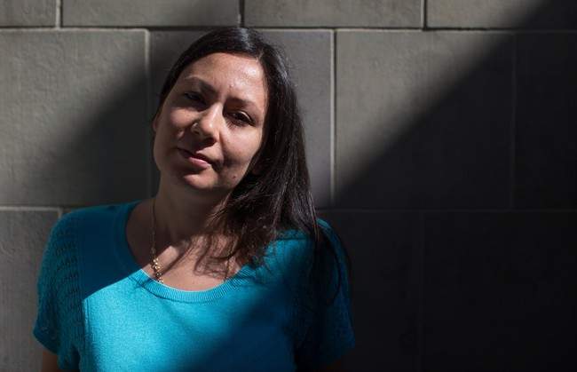 Syrian refugee Mai Eilia, who came to Canada in 2013, stands for a photograph in Vancouver, B.C., on Friday September 11, 2015.