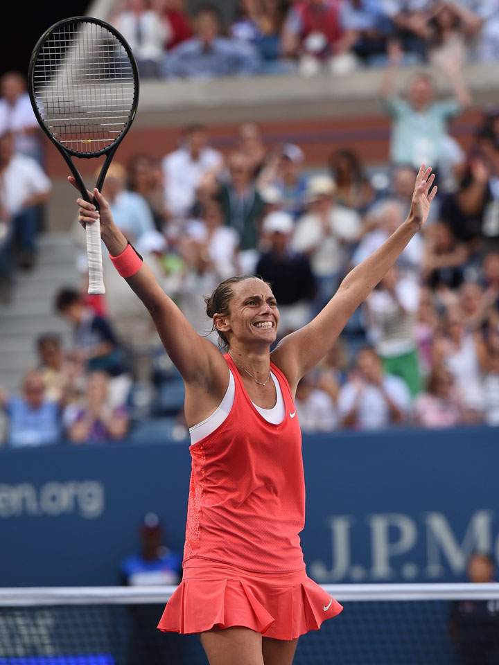 Roberta Vinci of Italy celebrates her victory over Serena Williams of the US during their US Open 2015 women's singles semifinals match at the USTA Billie Jean King National Center September 11, 2015 in New York.