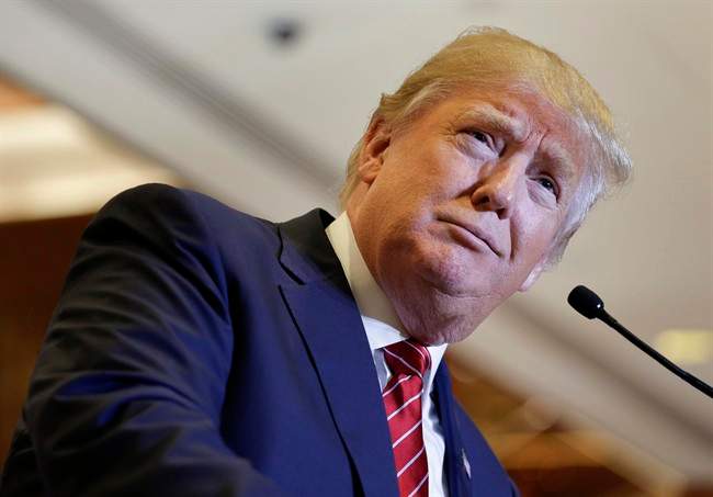In this Sept. 28, 2015, photo, Republican presidential candidate Donald Trump pauses while speaking about his tax plan during a news conference in New York. 