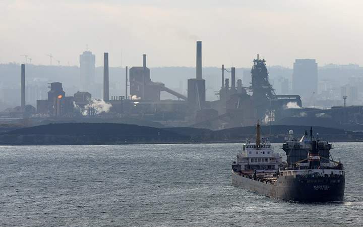 Ship AlgoSteel about to dock in Hamilton, Ont. with a load of iron ore.