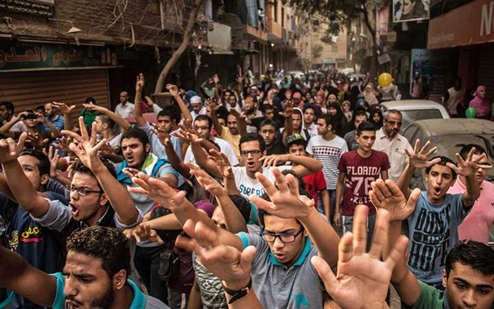 Protesters protest in support of ousted president Mohammed Morsi, in Talbiyah, Egypt on Sept. 24, 2015.