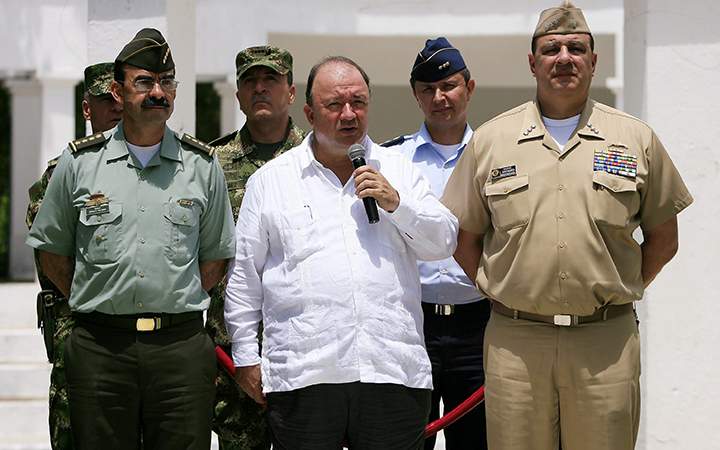 Colombian Defense Minister Luis Carlos Villegas speaks to the press flanked by top Colombian Armed Forces Commanders, to announce the killing of drugs lord and guerrillas leader Victor Ramon Navarro aka Megateo by Colombian authorities, during a military operation at Cataumbo region bordering Venezuela, in Santa Marta on October 2, 2015.