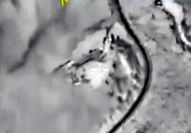 In this photo made from footage taken from Russian Defense Ministry official web site on Saturday, Oct. 3, 2015 a bomb explosion is seen in Syria. Pentagon officials urged the Russian military on Thursday to focus its airstrikes in Syria on Islamic State fighters rather than opponents of Syrian President Bashar Assad, U.S. administration officials said.