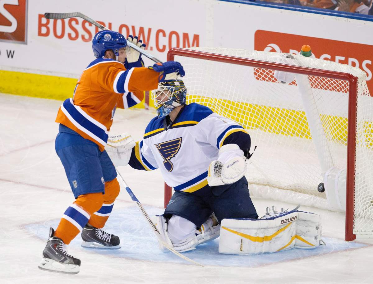 St. Louis Blues goalie Brian Elliott (1) is scored on by Edmonton Oilers’ Taylor Hall (4) during third period NHL action in Edmonton, Alta., on Thursday October 15, 2015.