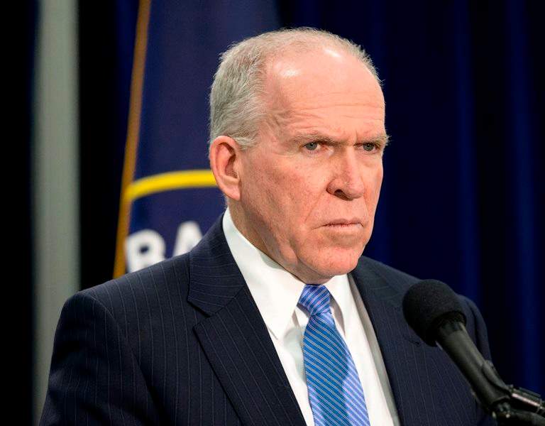 In this Dec. 11, 2014 fie photo, CIA Director John Brennan listens during a news conference at CIA headquarters in Langley, Va. An anonymous hacker claims to have breached CIA Director John Brennan’s personal email account. 