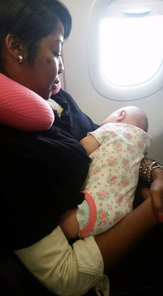 Kindness in mid-air: Stranger quiets new mom’s crying baby during flight - image