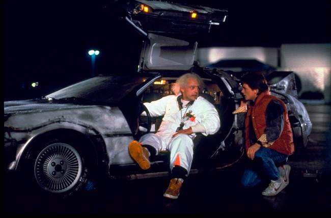 This photo provided by Universal Pictures Home Entertainment shows Christopher Lloyd, left, as Dr. Emmett Brown, and Michael J. Fox as Marty McFly in the 1985 film, "Back to the Future." .