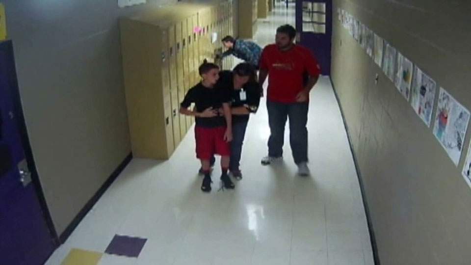 ‘He was purple, his eyes were bulging’: Missouri teacher caught on camera saving student’s life - image