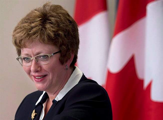 Public Works Minister Diane Finley provides an update on the federal shipbuilding project at the Irving Shipyard facility in Halifax on Thursday, Feb. 6, 2014. Longtime MP and former cabinet minister Diane Finley says she intends to run for the interim leadership of the Conservative party. 