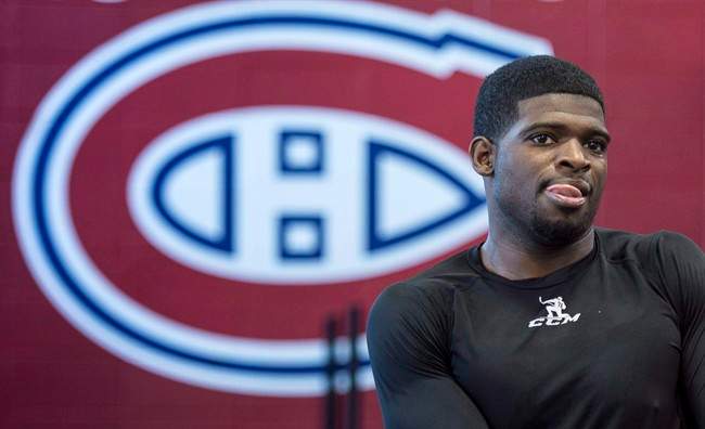 Montreal Canadiens P.K. Subban stretches during medical examinations on the first day of training camp Thursday, September 17, 2015 in Brossard, Que.