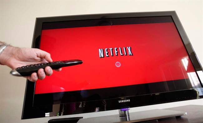 A person uses Netflix in Palo Alto, Calif in this July 20, 2010 file photo.