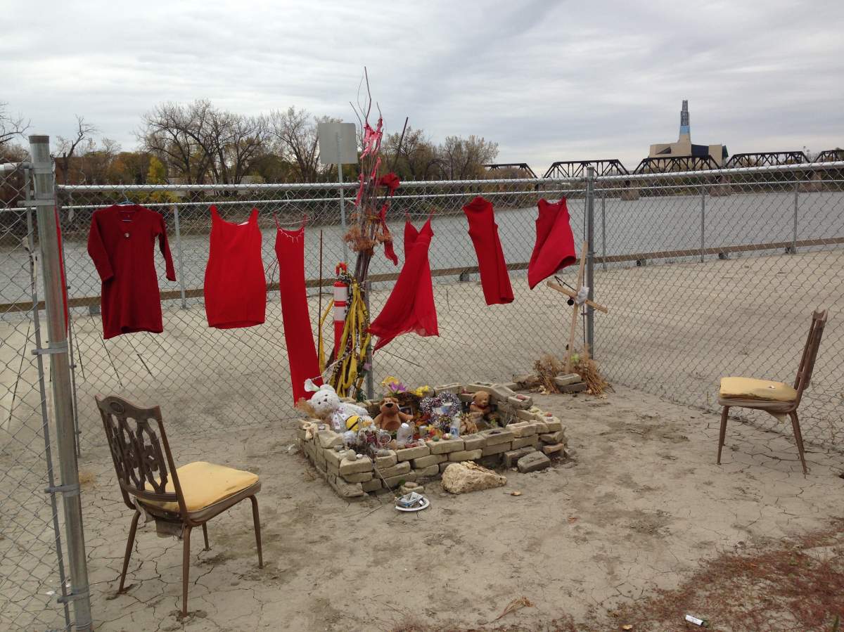 Dresses overlook the makeshift memorial for slain teen Tina Fontaine.