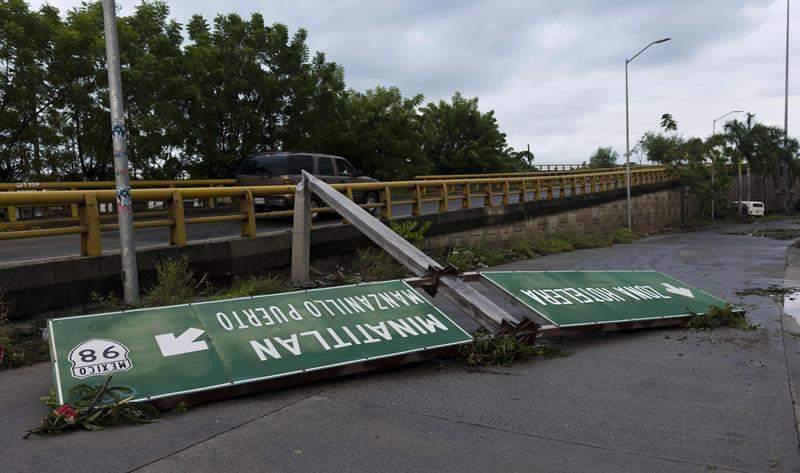 View of a fallen traffic sign in Manzanillo, state of Colima, after Hurricane Patricia hit the shore of neighbouring Jalisco state, on October 24, 2015.