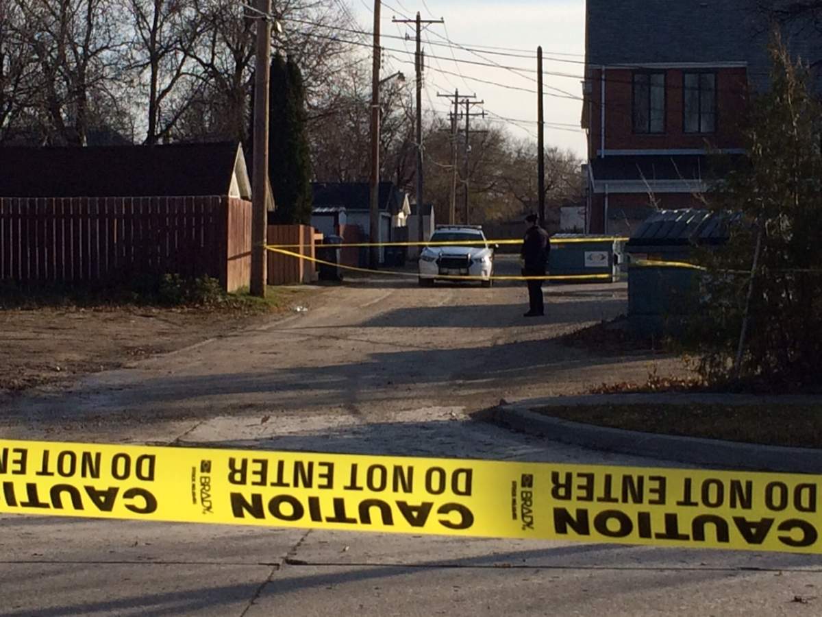 Winnipeg police taped off an area at Marion Street and Dufresne Ave, including the back lane and shut down a stretch of Marion in that area Friday.