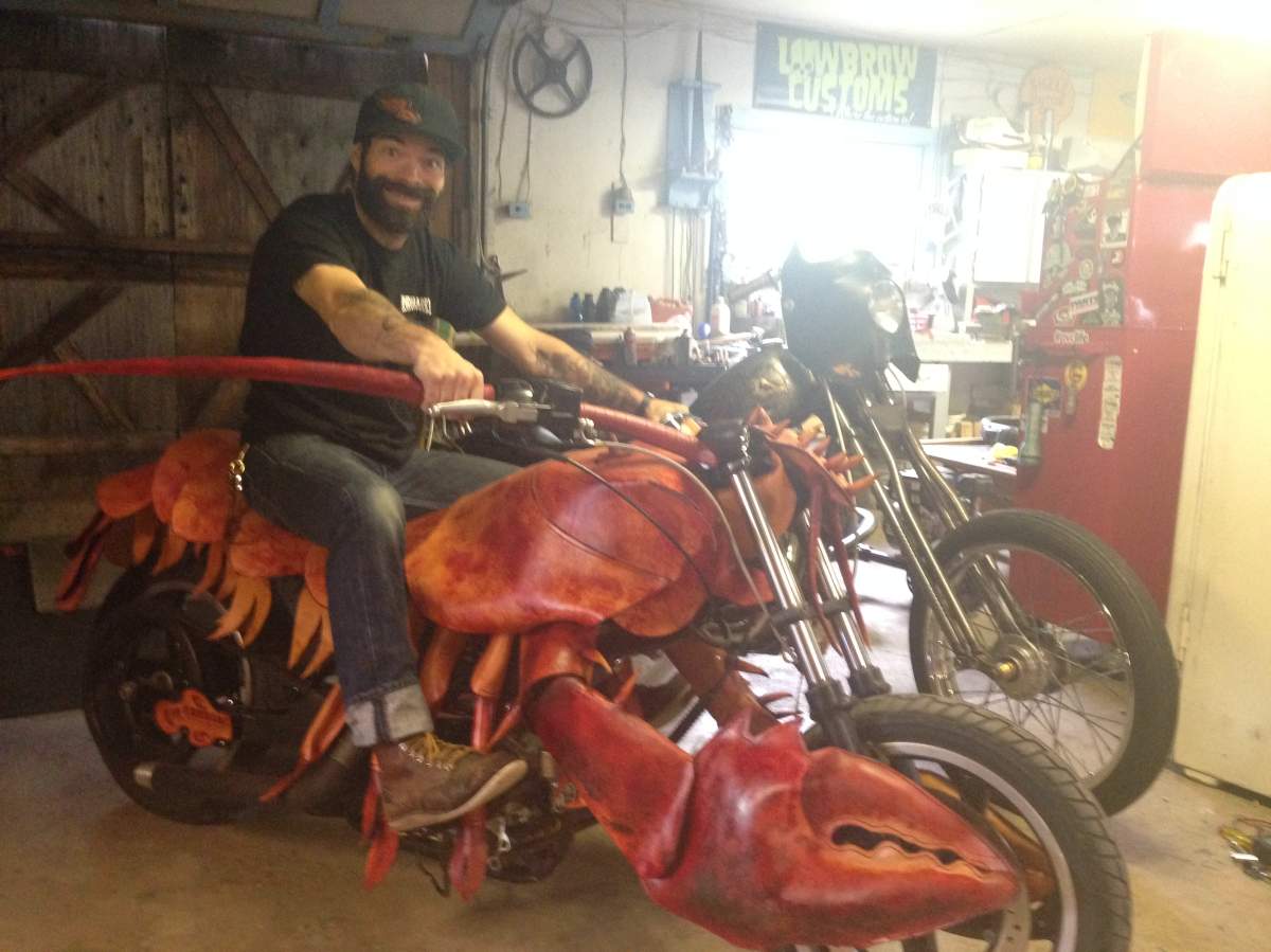 Timo sits on his fully rideable Lobster Roll.