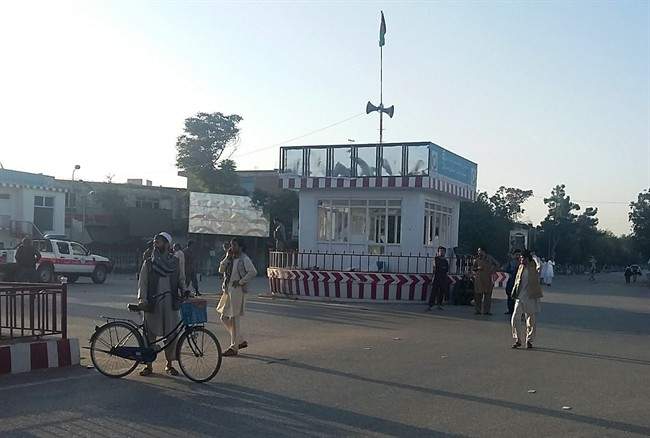 Afghans walk in the main square of Kunduz city, north of Kabul, Afghanistan, Thursday, Oct. 1, 2015. An Afghan official says government forces have retaken the strategic northern city of Kunduz, which was seized by the Taliban on Monday. The spokesman says it could take some days to "clear the city," but that Taliban forces have retreated. He says about 200 Taliban fighters have been killed. (AP Photo).
