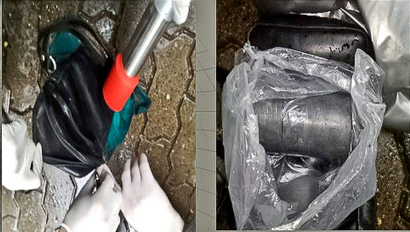 In this June 27, 2011 combination of images provided by the Moldova General Police Inspectorate, a sample of uranium-235 is tested for radioactivity in Chisinau, Moldova.