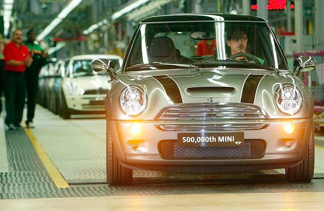In this Aug. 25, 2004 file photo, the 500,000th Mini is driven off the production line at BMW Group Plant in Oxford, England. The Mini Cooper is among the top 10 stolen vehicles in Atlantic Canada.