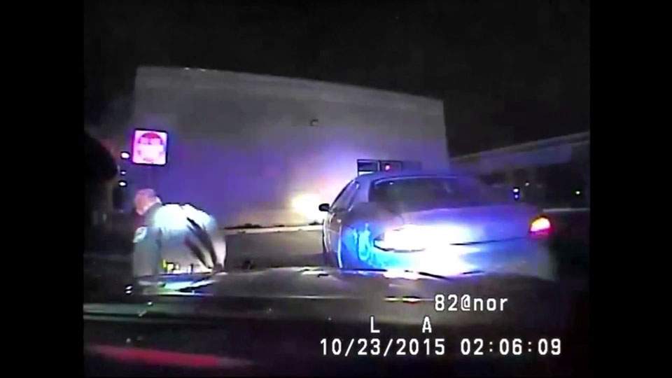Caught on camera: Michigan woman slams car into police officer after traffic stop - image
