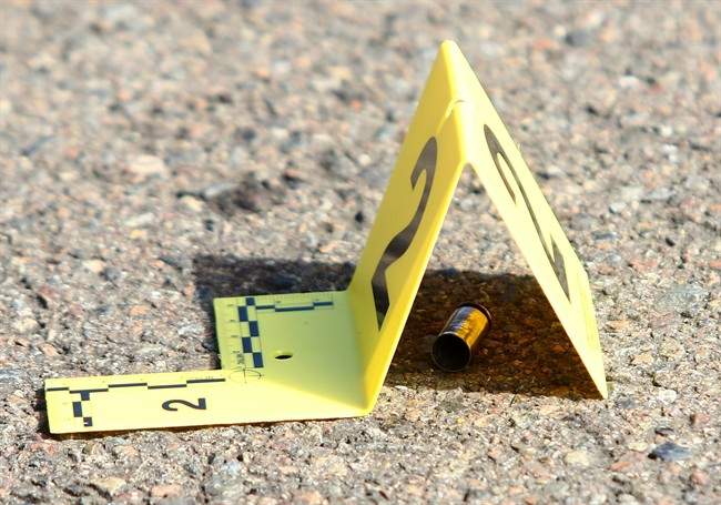 A bullet casing is marked at the scene of a deadly shooting at Umpqua Community College in Roseburg, Ore., Thursday, Oct. 1.
