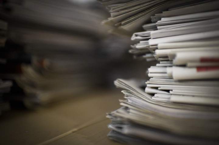 A stack of newspapers.