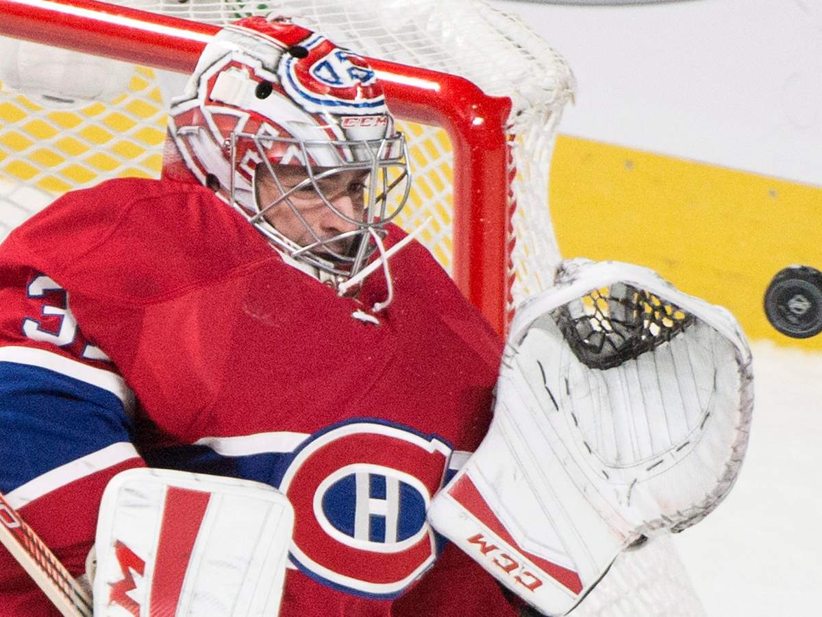 Montreal Canadiens goaltender Carey Price makes a save against the Saint Louis Blues during third period NHL hockey action in Montreal, Tuesday, October 20, 2015. 