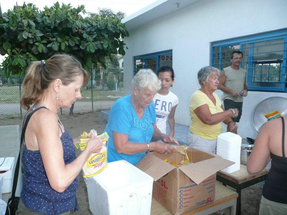 Helping get food ready ahead of Hurricane Patricia hitting land.