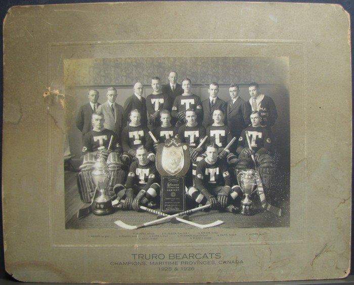 The Truro Bearcats Senior Hockey team poses with the Starr Shield trophy.