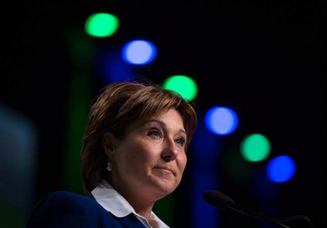 British Columbia Premier Christy Clark pauses while addressing the LNG in BC Conference in Vancouver, B.C., on Wednesday October 14, 2015. 